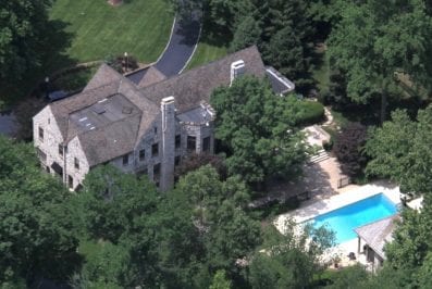 Top view of residential home with pool